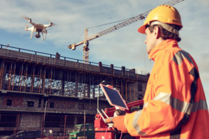 Contractor operating drone | Drones in construction - current and future uses