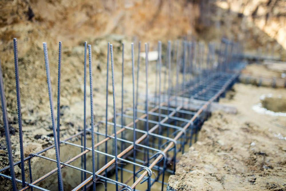 Rebar protruding from ground of construction site