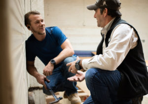 Contractor talking with a lender on a job site Contractor talking with a lender on a job site