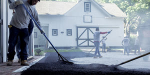 Laying asphalt on a construction project