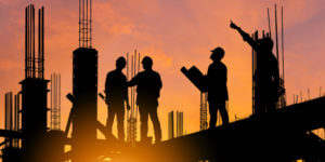 Project manager and contractors on jobsite
