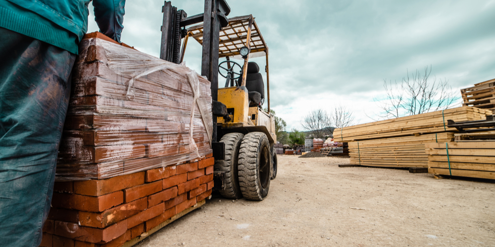 Material supplier prepares shipment of bricks