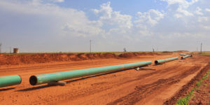 Natural gas pipes awaiting installation in Permian Basin