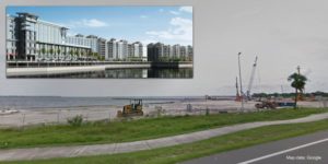 A photo of the incomplete Sunseeker construction site overlaid with a 3D mockup of the proposed resort exterior