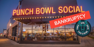 Exterior of a Punch Bowl Social location with company logo and bankruptcy tag