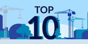 The words "Top 10" surrounded by construction cranes
