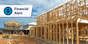 Photo of unfinished house with financial alert graphic