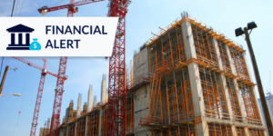photo of construction site with financial alert tag