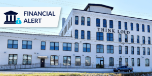 Think Loud building in York, PA with financial alert icon