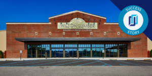 Image of Wilson Lumber building with customer success story icon