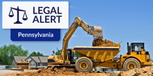 Photo of construction equipment with Pennsylvania legal alert graphic