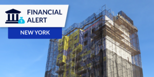 photo of hotel under construction with New York financial alert graphic