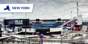 Exterior photo of Buffalo Bills football stadium with 'New York' icon and state outline in upper left corner