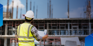 Successful contractor habits: Photo of a contractor reviewing a building site and holding plans