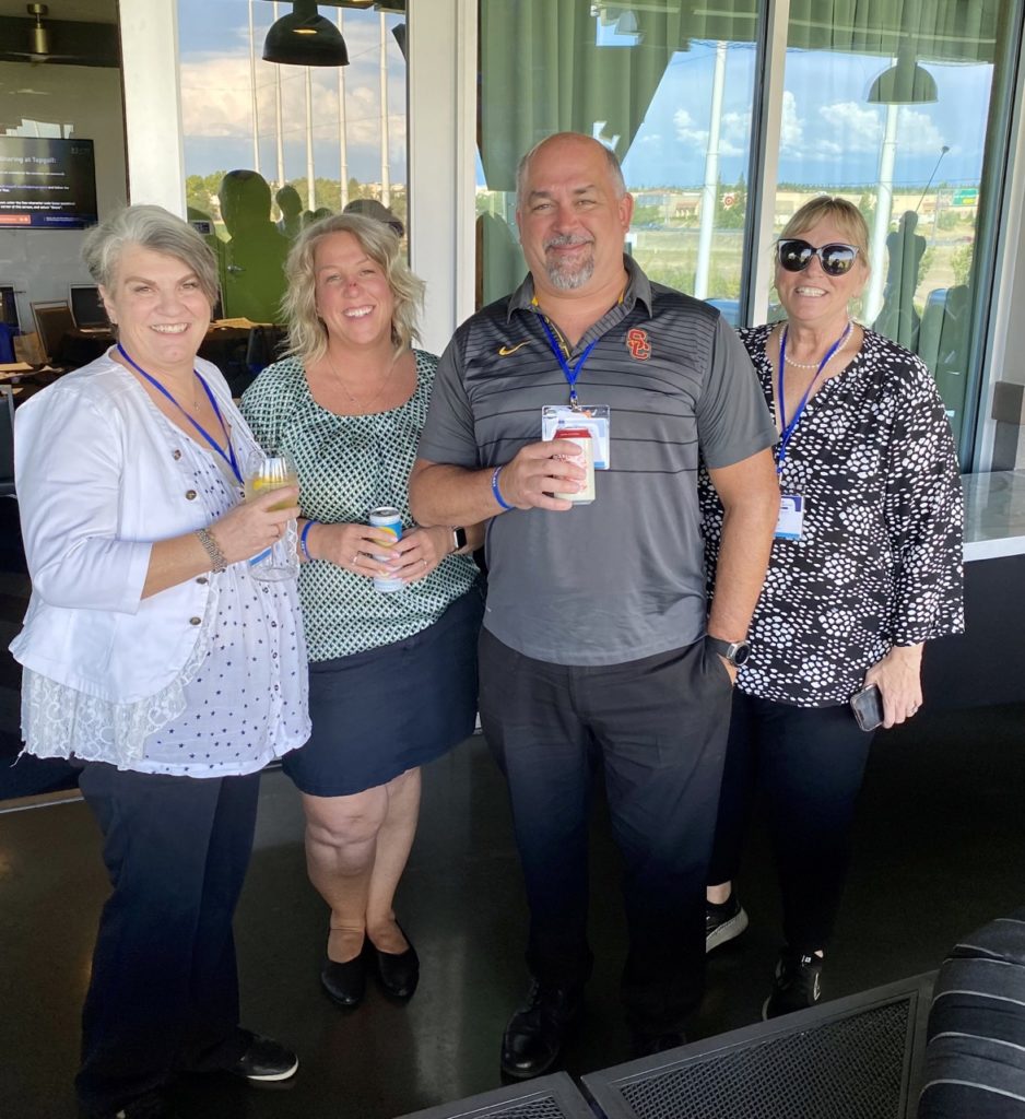 D'Ann Johnson and Charlotte Rimmer (A-Core Concrete), Barry Dambrowski (Emser Tile), Lisa Newberg (Caine & Weiner)