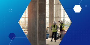 photo of builders at work on a construction site inspecting concrete pillars
