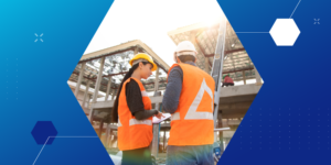 Professional liability insurance discussed between two workers on a construction site