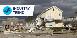 Photo of a hurricane-damaged house on the shoreline after Hurricane Sandy with an "Industry Trends" label